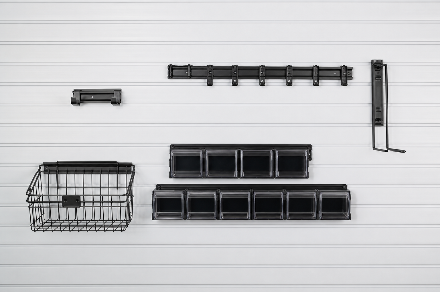 Empty wall storage rails, bins, basket, and holders